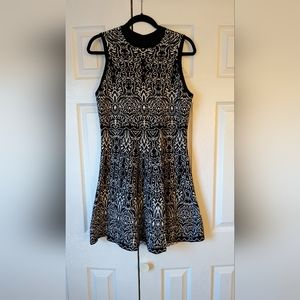 Black and white printed high neck sweater dress